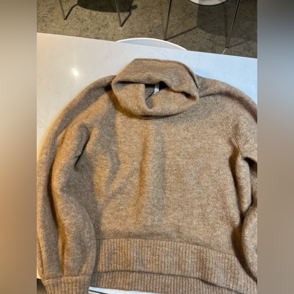 Size small Aritzia camel coloured wool sweater.